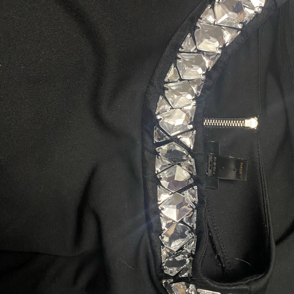 Sleeveless top with crystals neckline, zipper in the back. Worthington woman